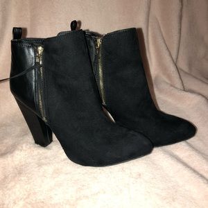 Black and gold high heeled booties